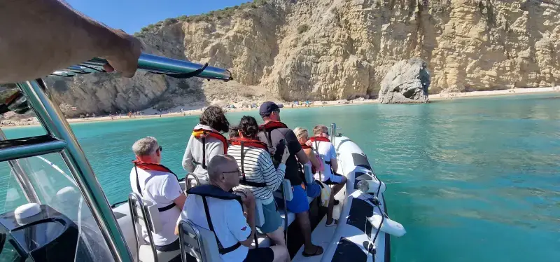 Explore Sesimbra's Wild Beaches and Scenic Caves on a Memorable Boat Tour
