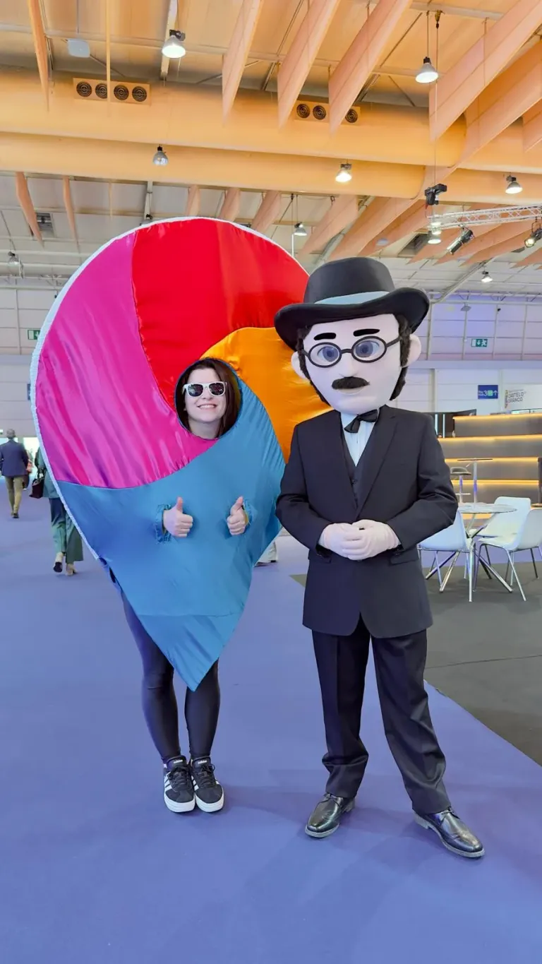 SEE Countries mascot with a costumed character in the BTL 2026 exhibition hall