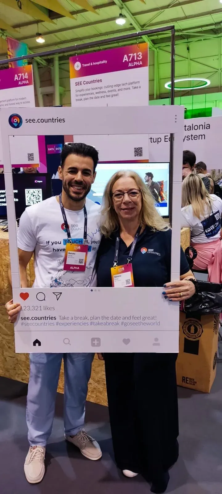 Renato Calvão and a SEE Countries team member with a branded photo frame at Web Summit 2024