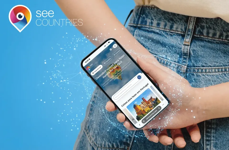 Hand holding a smartphone showing the SEE Countries platform